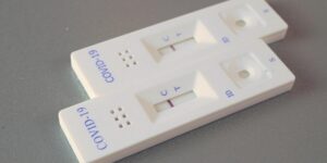 Close-up of two COVID rapid tests on a table